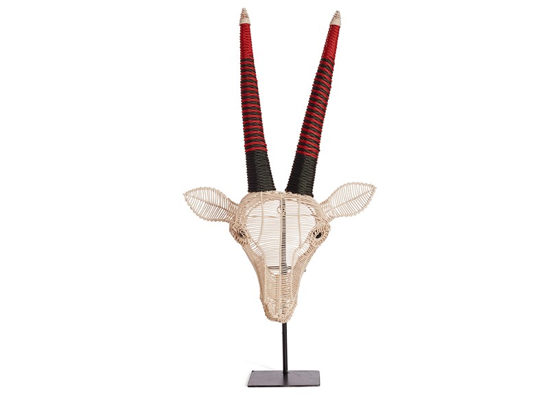 Red and green - cream head on a stand Red and green - cream head on a stand